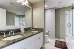 Master en suite bath includes a 6 foot tub, shower, double sinks and vanity area. 